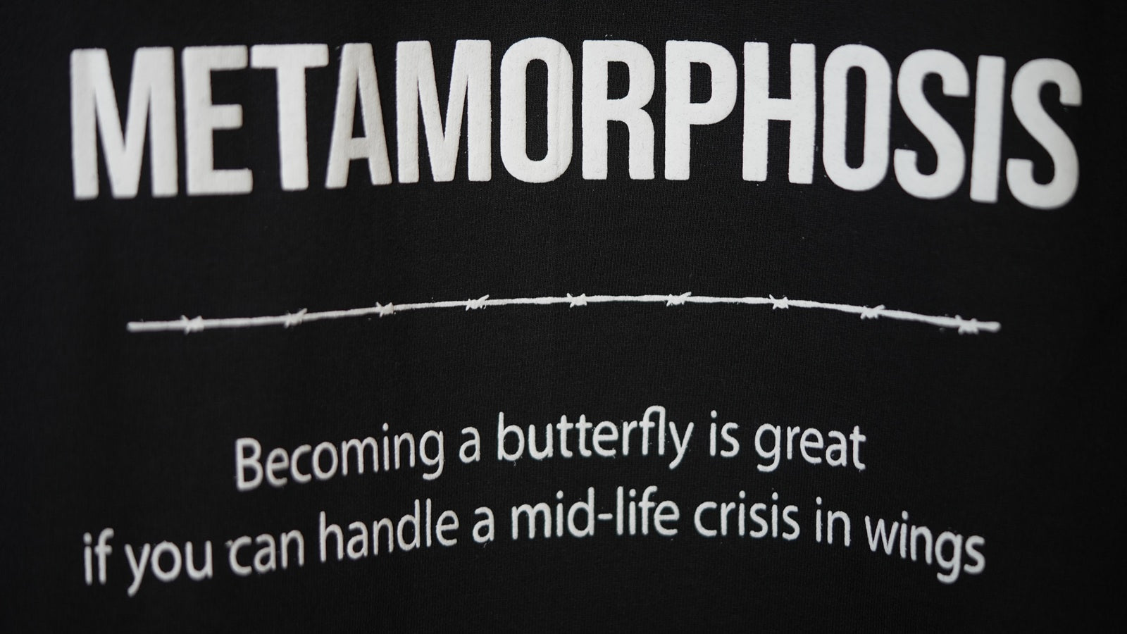 Metamorphosis - Black Tee