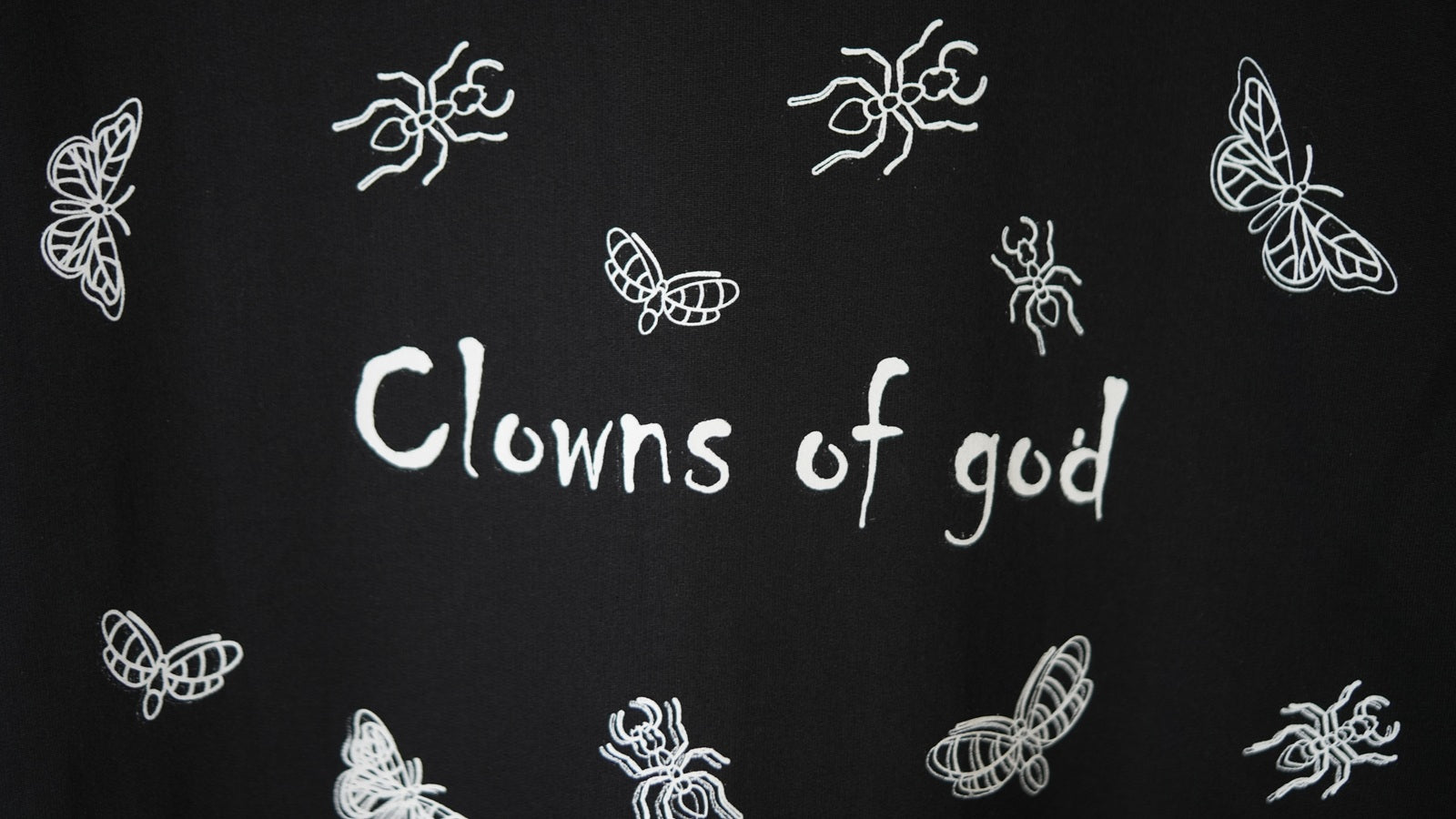 Metamorphosis - Black Tee